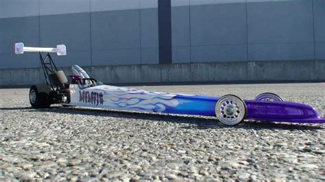 Rc drag racing - Primal RC is proud to introduce the 1/5 Scale Quicksilver Ready to Run gas powered Dragster! NOW 32cc!! We hope that its High quality parts, performance and good looks will give you many hours of exciting tire shredding, asphalt burning RC Dragster Racing Fun! We used lots of CNC aluminum and carbon fiber parts to make this a strong, reliable, fast …
